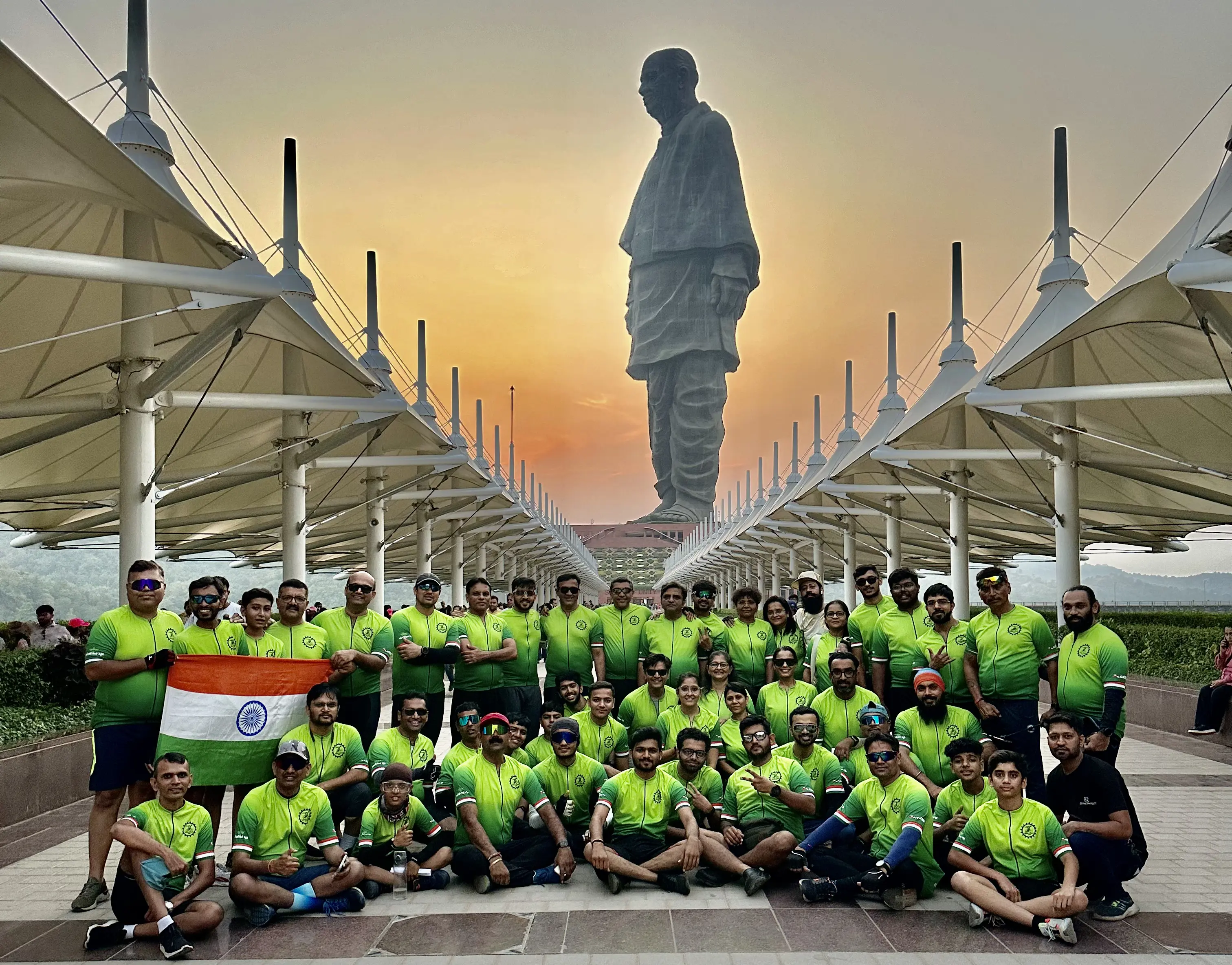 THE ANAND CYCLING CLUB riders riding at dawn across Charotar